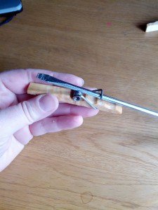 Putting Second side into Clothespin spring
