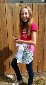 Young girl in apron